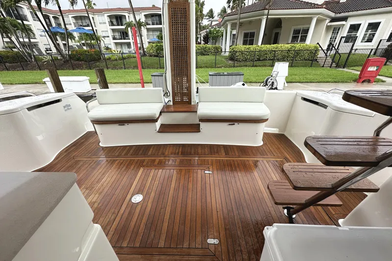 Slide: The Image of Luxurious 2014 Ferretti Yachts 530 with elegant teak deck and comfortable seating. - 6