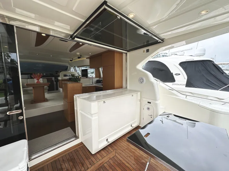 Slide: The Image of Luxurious 2014 Ferretti Yachts 530 interior with modern design and spacious deck area. - 9