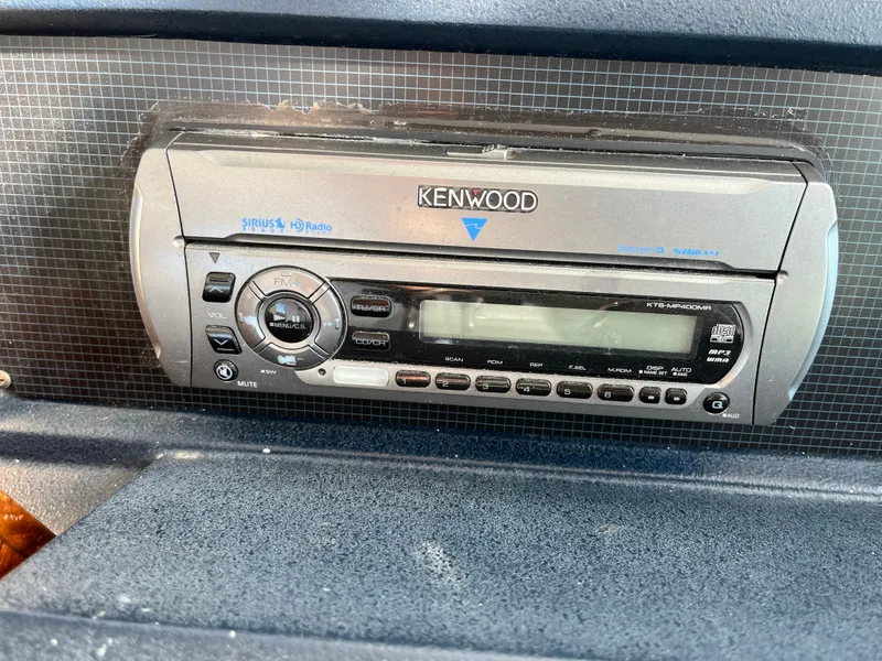 Slide: The Image of Kenwood stereo system in a 1987 Sea Ray 460 boat dashboard. - 24