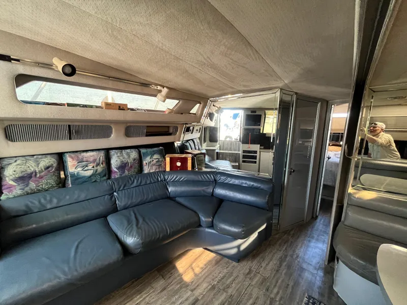 Slide: The Image of Interior of 1987 Sea Ray 460 yacht with leather seating and modern decor. - 36