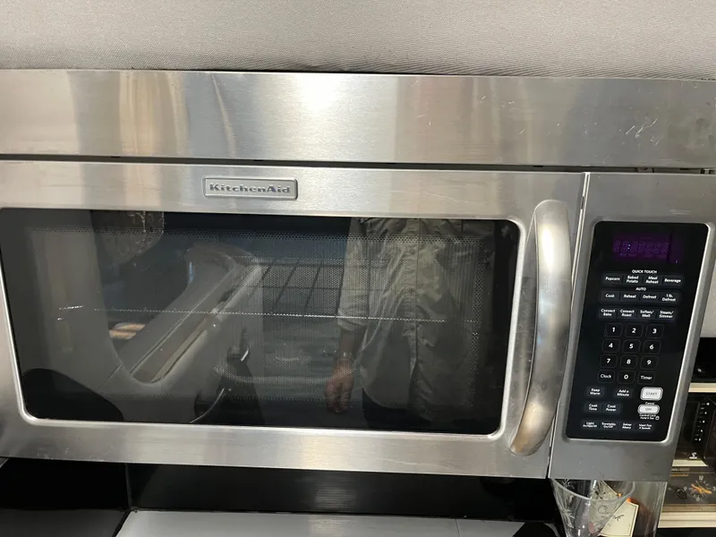 Slide: The Image of Stainless steel KitchenAid microwave with digital control panel. - 43