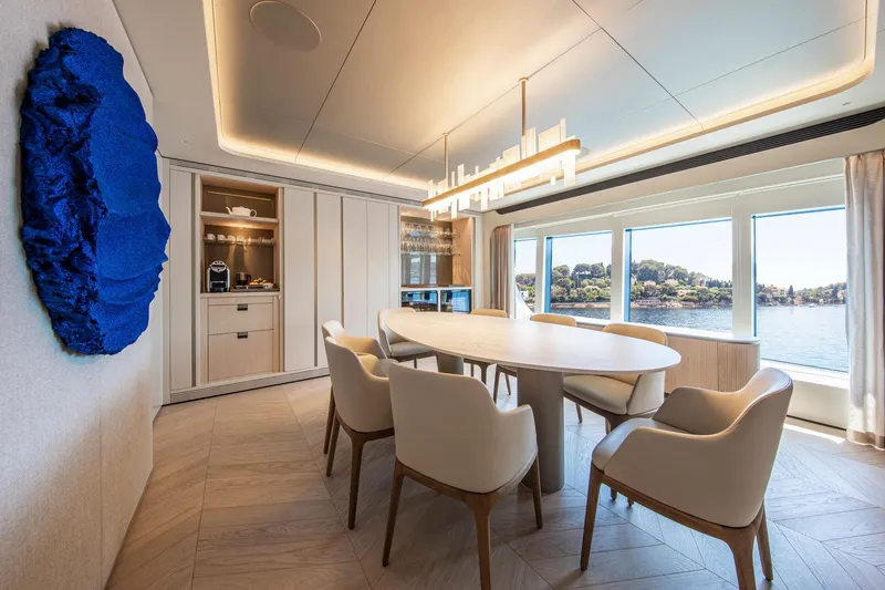 Slide: The Image of Luxurious dining area on 2021 Van der Valk Custom 34M Explorer yacht with scenic ocean view. - 15