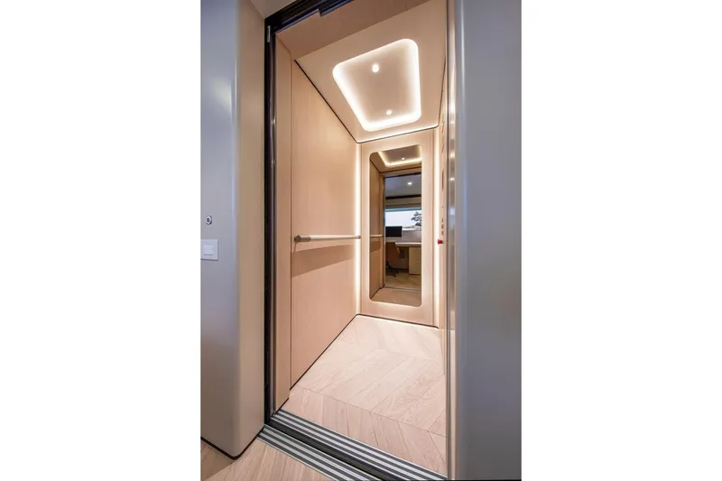 Slide: The Image of Luxurious interior of 2021 Van der Valk Custom 34M Explorer yacht elevator. - 22