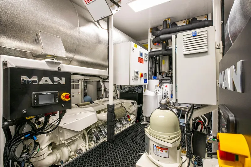 Slide: The Image of Engine room of 2021 Van der Valk Custom 34M Explorer yacht, featuring MAN equipment. - 25