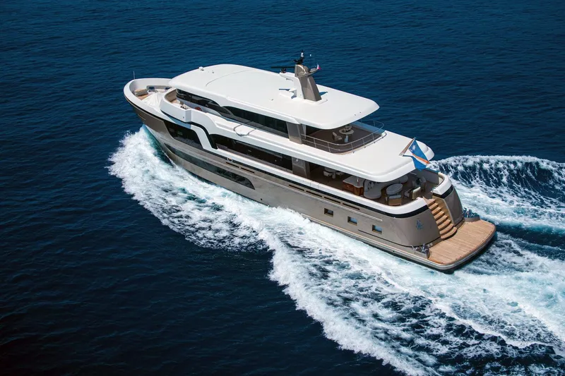 Slide: The Image of Van der Valk Custom 34M Explorer yacht cruising on open sea, 2021 model. - 8