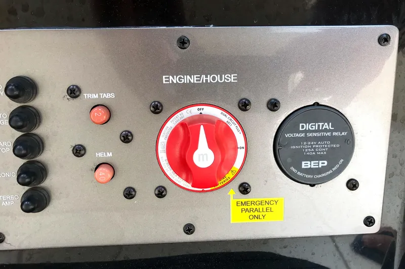 Slide: The Image of Control panel of a 2018 Scout 251 XSS boat with engine and digital relay. - 25