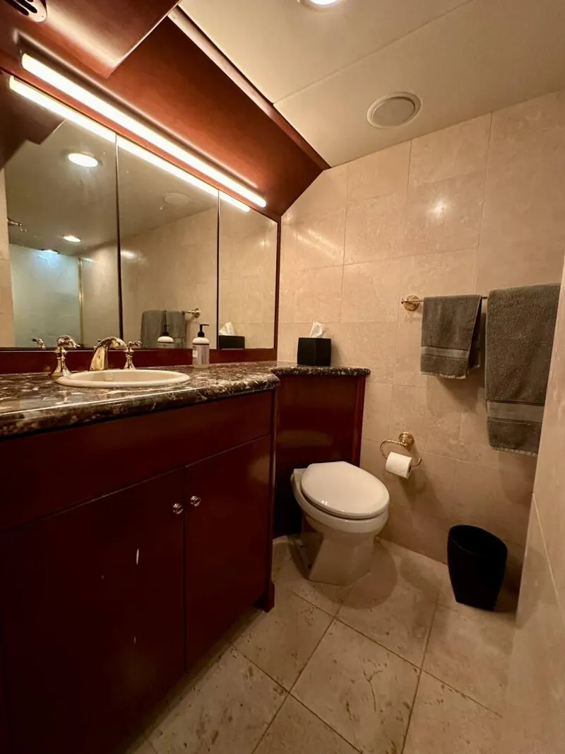 Slide: The Image of Luxurious bathroom in 2001 Dovercraft Custom RPH yacht with elegant fixtures and marble accents. - 28
