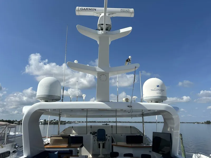 Slide: The Image of 2001 Dovercraft Custom RPH yacht with radar equipment, under a clear blue sky. - 35