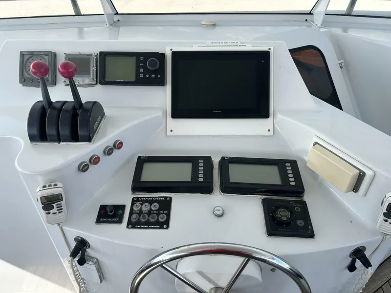 Slide: The Image of Control panel of 2001 Dovercraft Custom RPH yacht with navigation and communication equipment. - 37