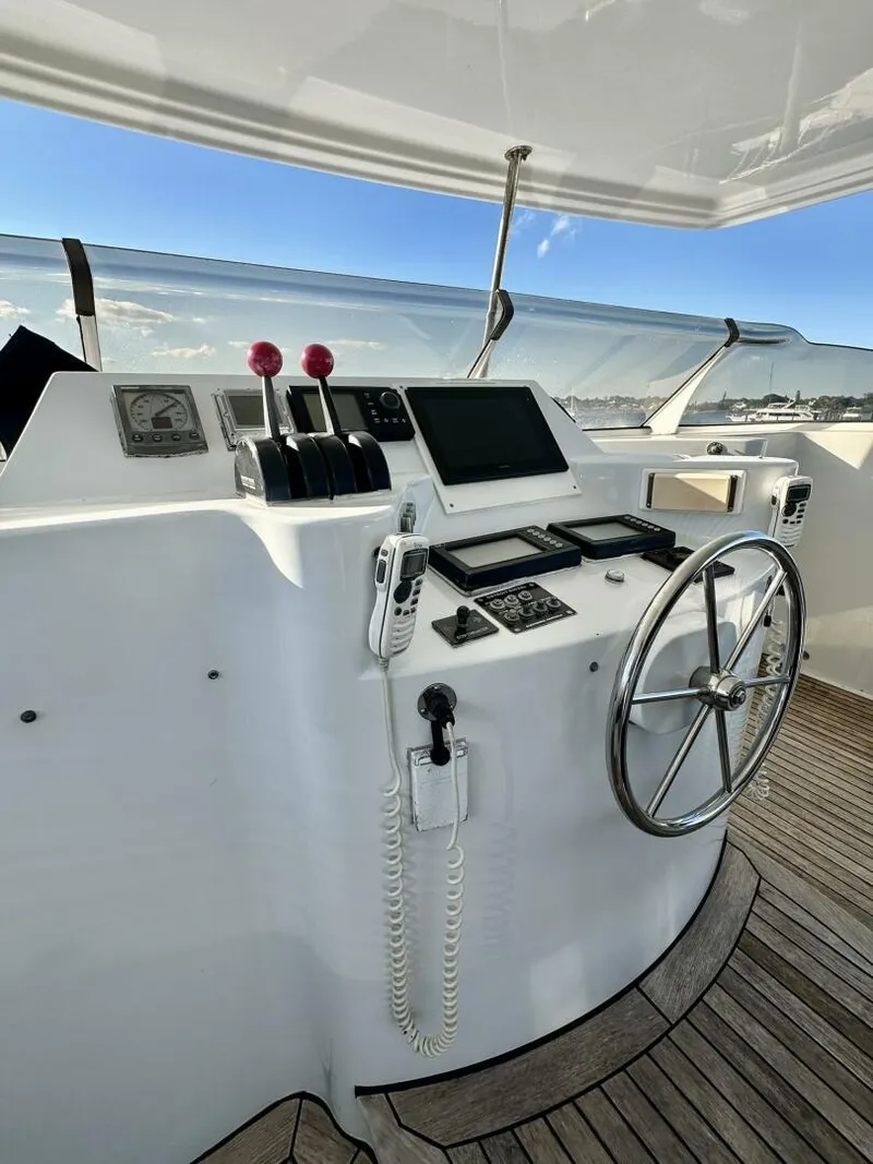 Slide: The Image of Helm of 2001 Dovercraft Custom RPH yacht with navigation equipment and steering wheel. - 38