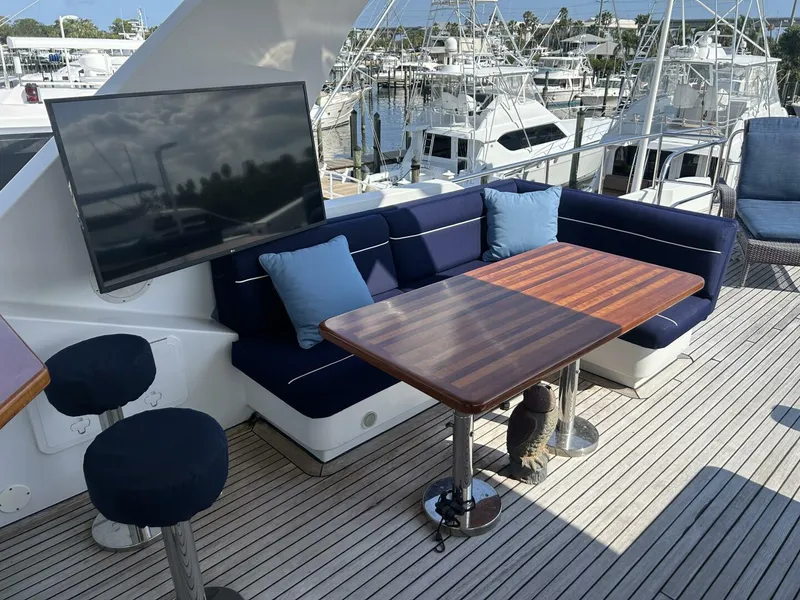 Slide: The Image of Luxurious 2001 Dovercraft Custom RPH yacht deck with seating, table, and TV. - 41