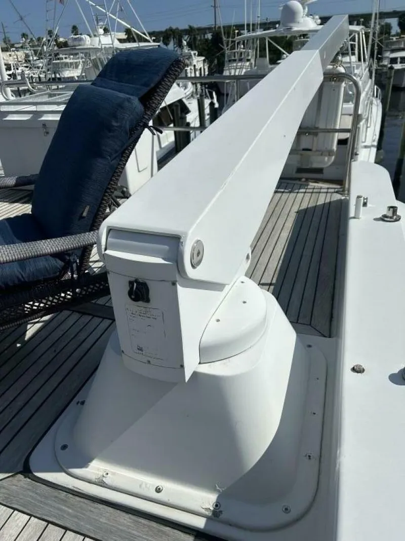 Slide: The Image of Deck of 2001 Dovercraft Custom RPH yacht with crane and seating area. - 44