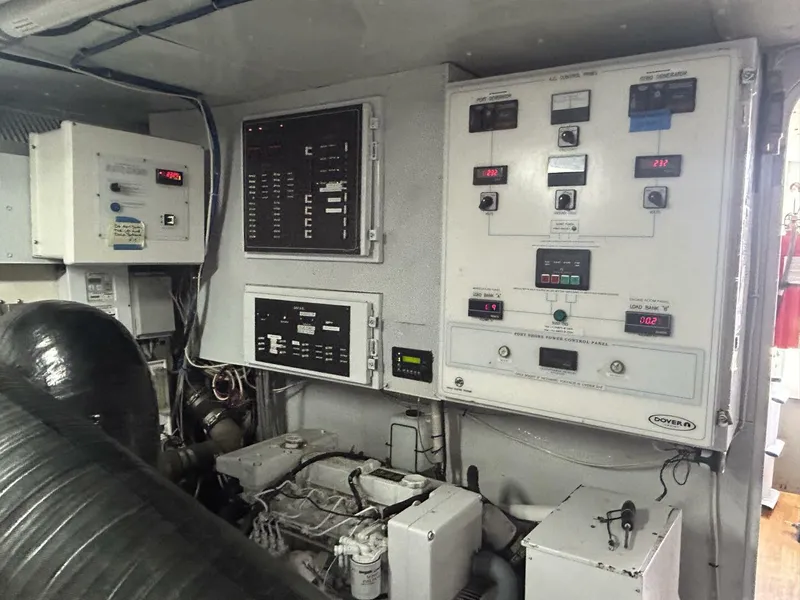Slide: The Image of Control panels and machinery inside a 2001 Dovercraft Custom RPH boat. - 49