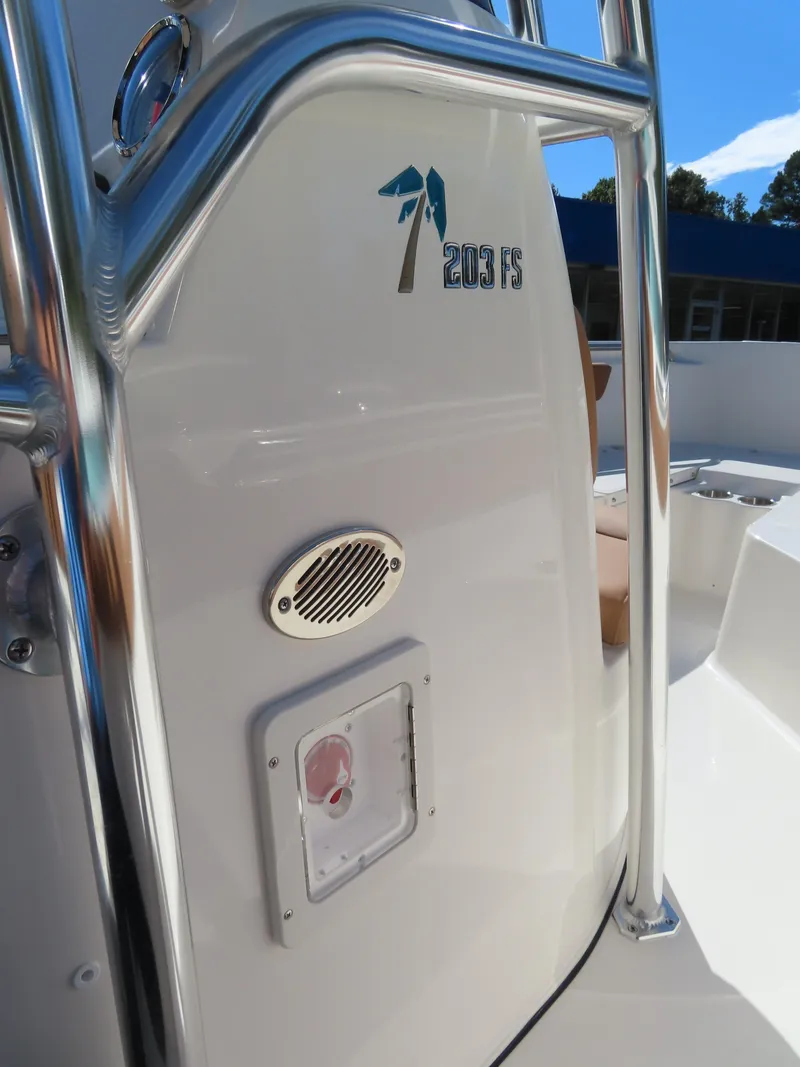 Slide: The Image of 2025 Key West 203 FS boat console with speaker and railing. - 10
