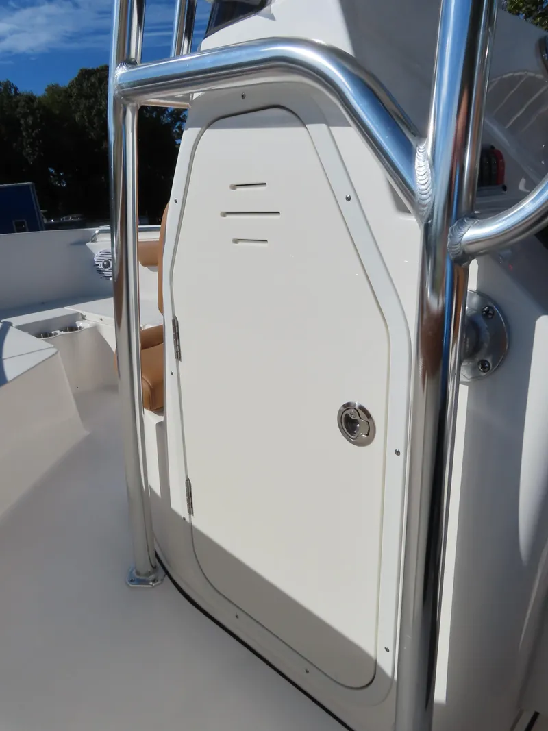 Slide: The Image of 2025 Key West 203 FS boat console with stainless steel railing. - 11
