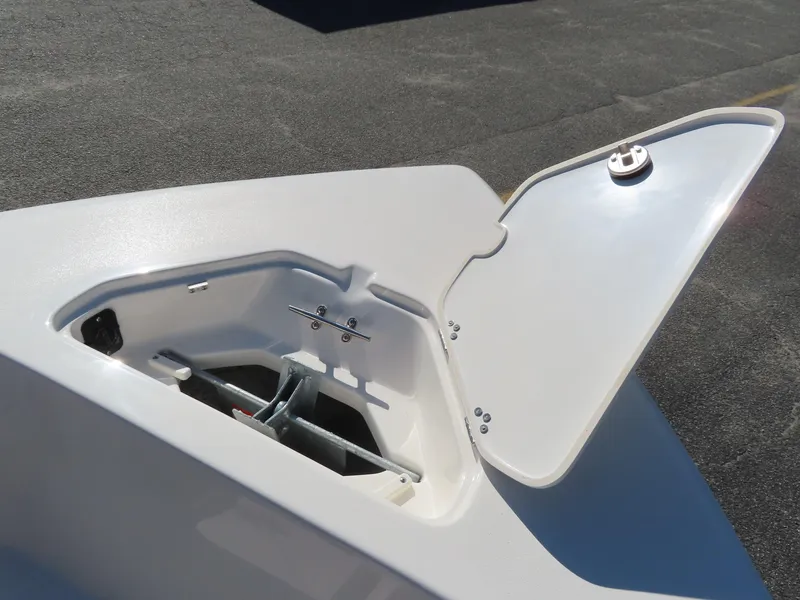 Slide: The Image of Open storage compartment on 2025 Key West 203 FS boat. - 13