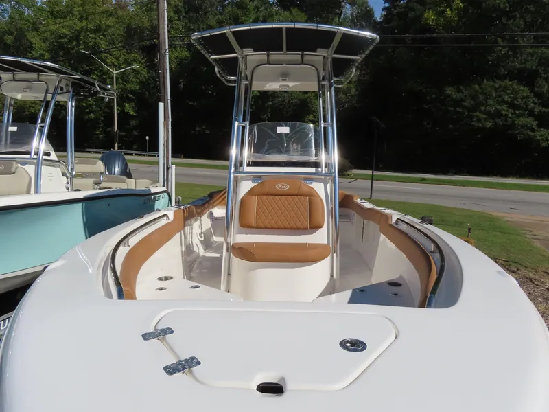 Slide: The Image of 2025 Key West 203 FS boat with sleek design and comfortable seating. - 3