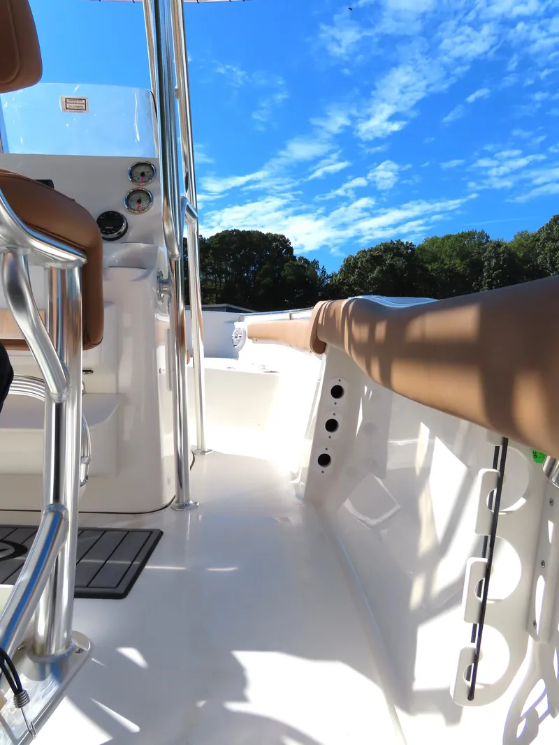 Slide: The Image of 2025 Key West 203 FS boat interior with clear blue sky background. - 5