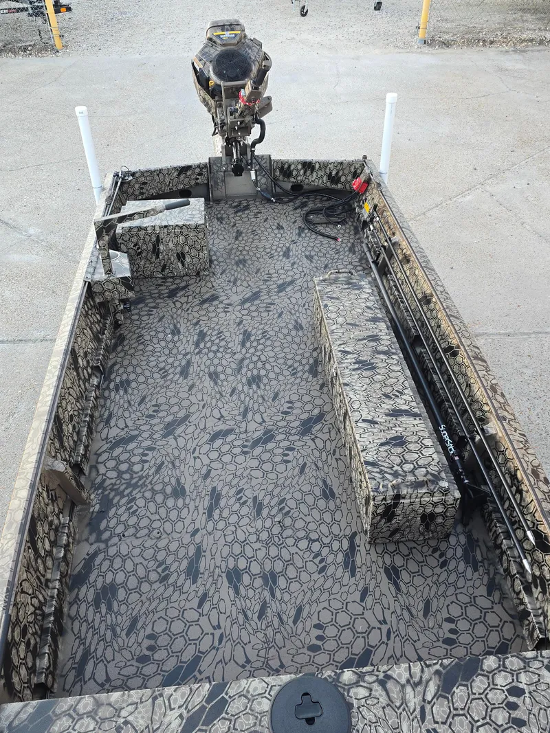 Slide: The Image of 2025 Pro-Drive SBX Series TD boat with camouflage interior design. - 10