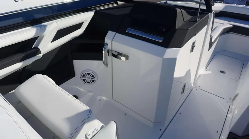 Slide: The Image of Interior of 2025 Cobalt R6 boat, featuring sleek white seating and modern design. - 16