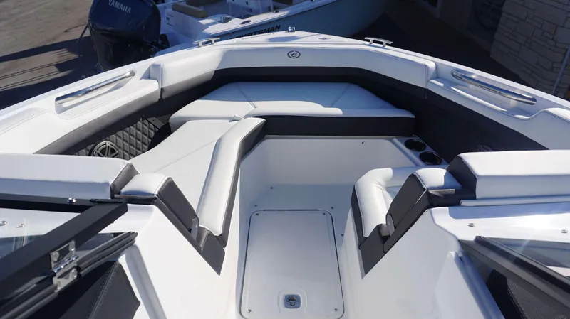 Slide: The Image of 2025 Cobalt R6 boat interior with sleek white seating and modern design. - 6