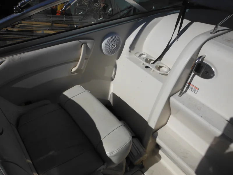 Slide: The Image of Interior of 2004 Sea Ray 215 Weekender boat with seating and speaker. - 20
