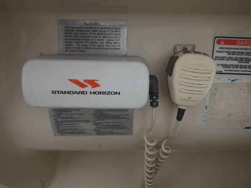 Slide: The Image of Standard Horizon radio equipment on 2004 Sea Ray 215 Weekender boat. - 45