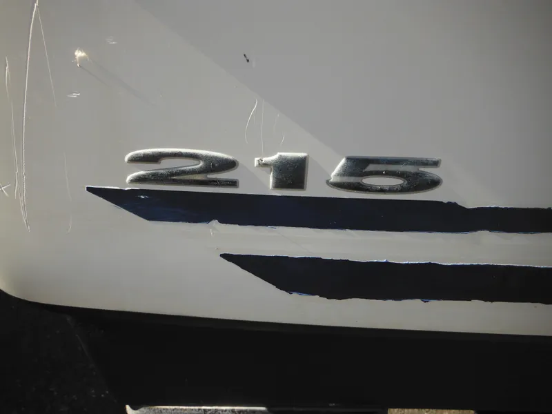 Slide: The Image of Close-up of 2004 Sea Ray 215 Weekender boat emblem. - 9