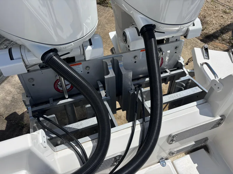 Slide: The Image of KenCraft 269 boat engines, 2025 model, with visible wiring and mounting components. - 11