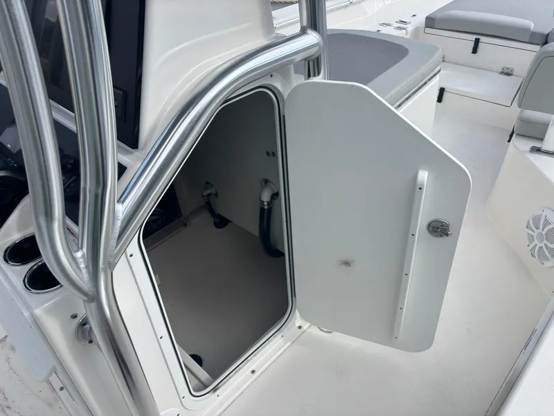 Slide: The Image of 2025 KenCraft 269 boat on trailer at marine sales dealership. - 22