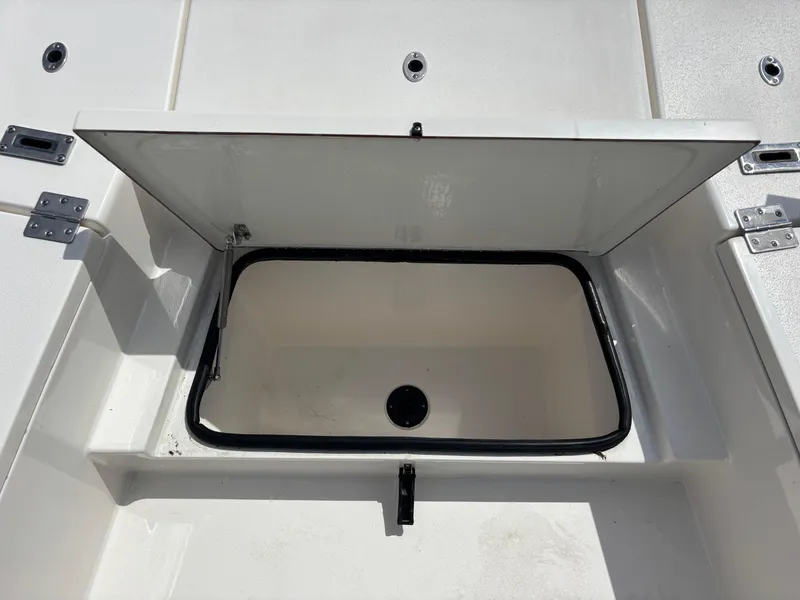 Slide: The Image of Open storage compartment on 2025 KenCraft 269 boat, showcasing interior space and design. - 39