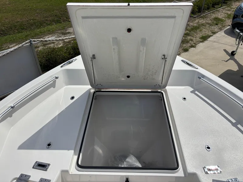 Slide: The Image of Open storage compartment on 2025 KenCraft 269 boat, showcasing spacious interior. - 42