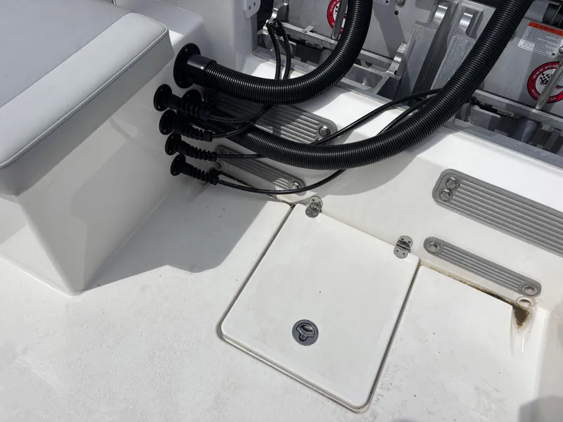 Slide: The Image of KenCraft 269 boat interior, 2025 model, featuring cable management and seating area. - 47