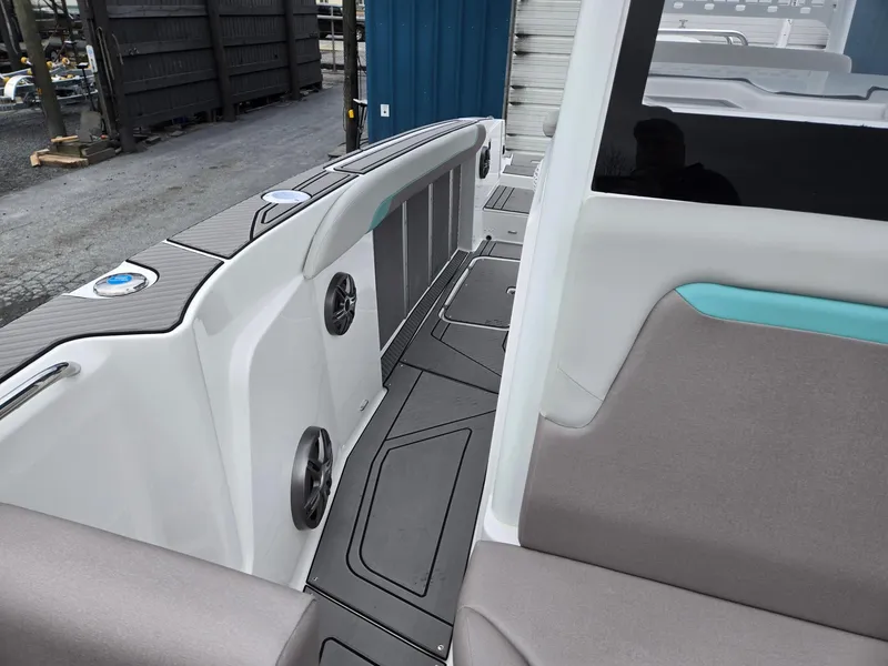 Slide: The Image of 2025 Hurricane Center Console 24 OB boat interior with modern seating and sleek design. - 10