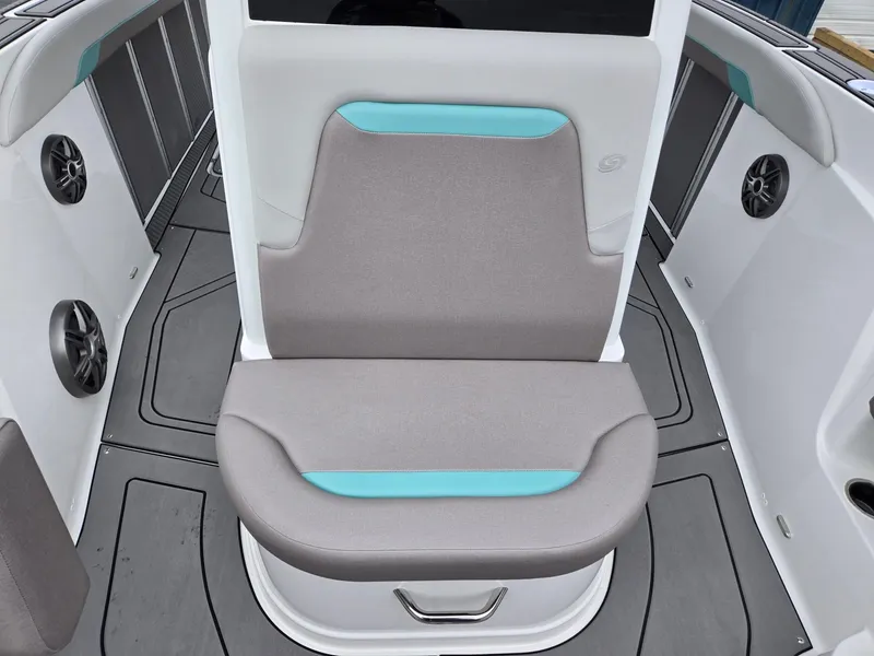Slide: The Image of 2025 Hurricane Center Console 24 OB boat seat with gray and teal accents. - 11