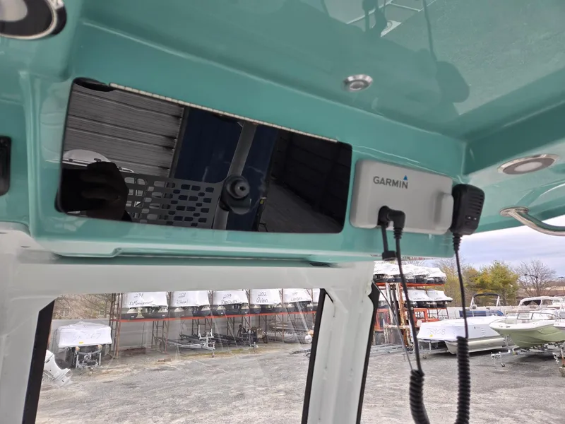 Slide: The Image of 2025 Hurricane Center Console 24 OB boat interior with Garmin device. - 20