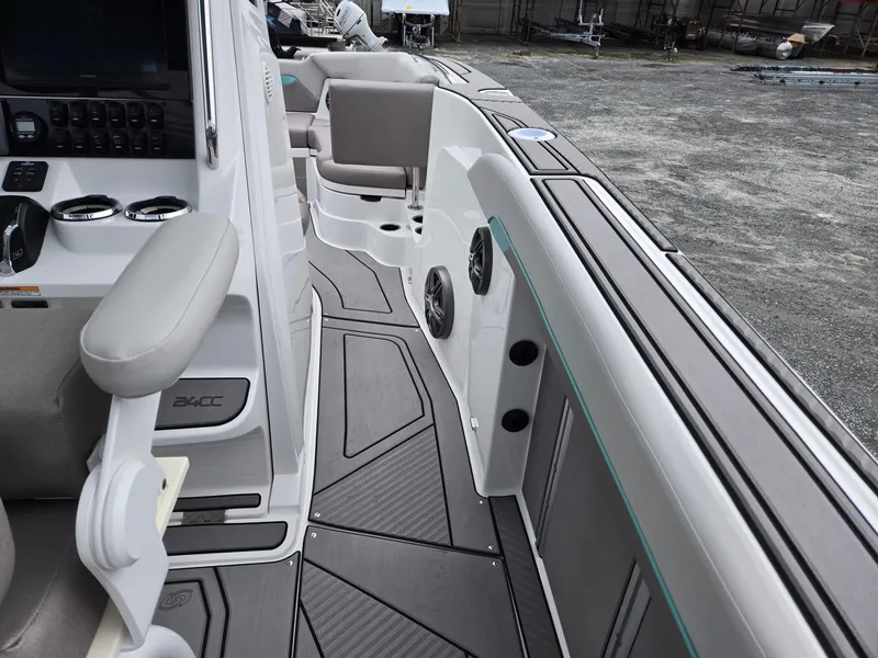 Slide: The Image of 2025 Hurricane Center Console 24 OB boat interior with modern seating and sleek design. - 29