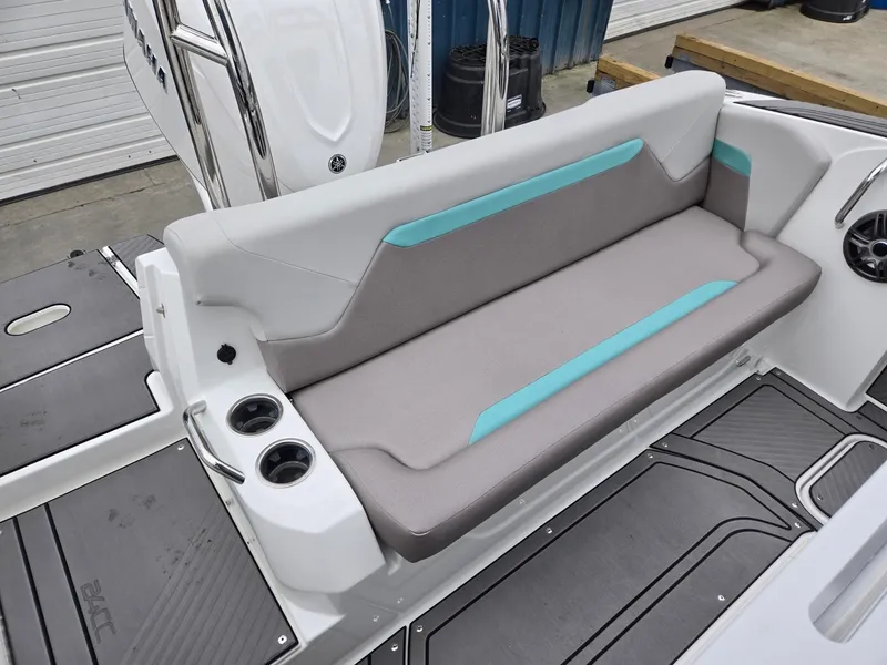 Slide: The Image of 2025 Hurricane Center Console 24 OB boat seating with cup holders and modern design. - 32