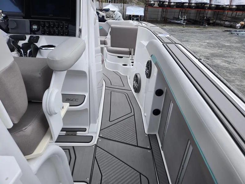 Slide: The Image of 2025 Hurricane Center Console 24 OB boat interior with modern seating and sleek design. - 35