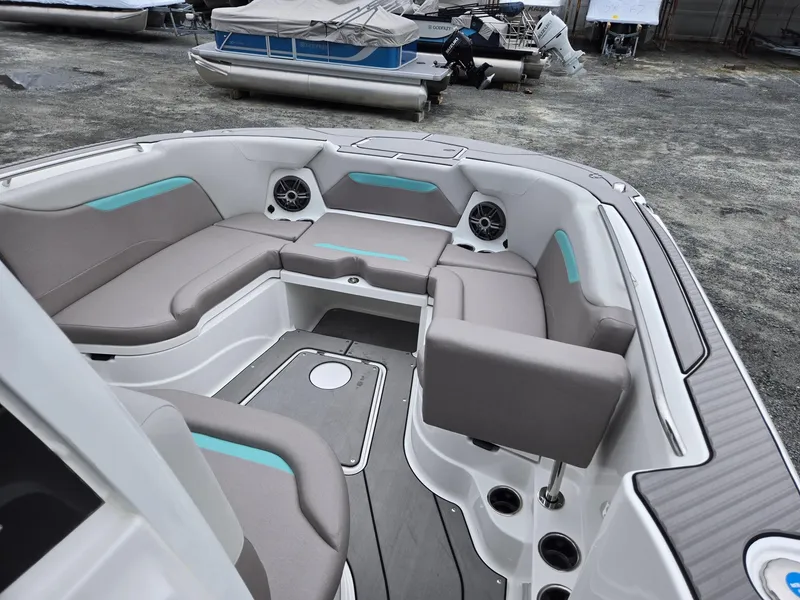 Slide: The Image of 2025 Hurricane Center Console 24 OB boat interior with spacious seating and modern design. - 40