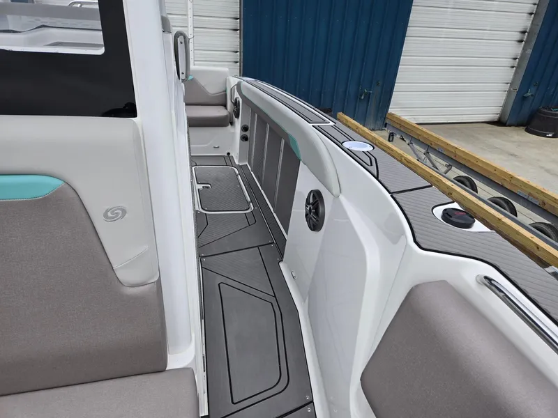 Slide: The Image of 2025 Hurricane Center Console 24 OB boat interior with modern seating and sleek design. - 9