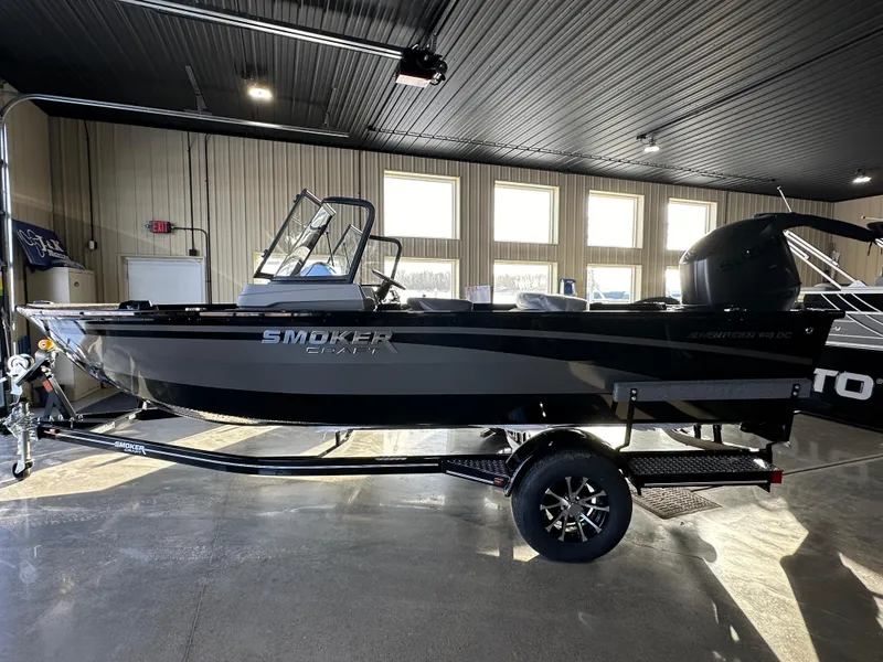 The Image of 2025 Smoker Craft Adventurer 188 DC boat in showroom, side view. - 0