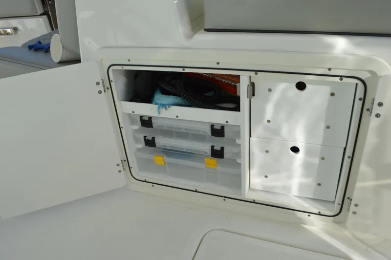 Slide: The Image of Pursuit 266 DC - Under Seat Storage - 31