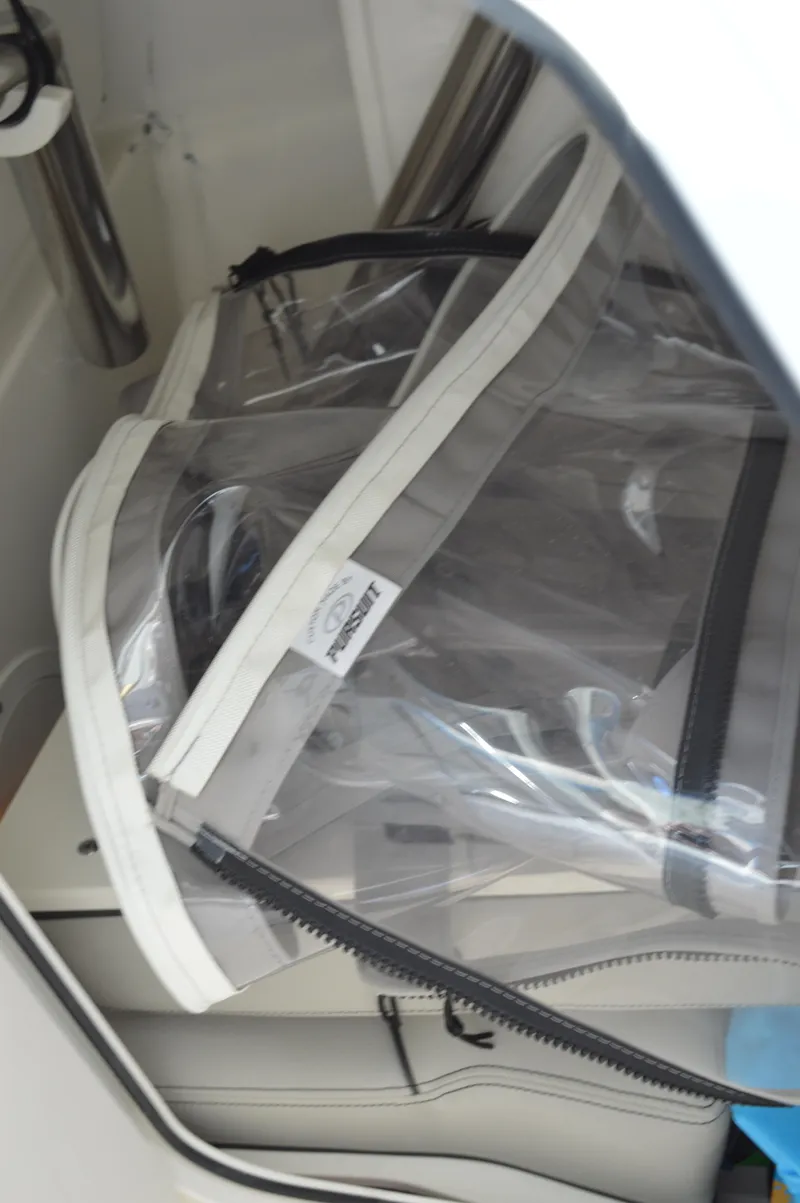 Slide: The Image of Pursuit 266 DC - Under Helm Storage - 50