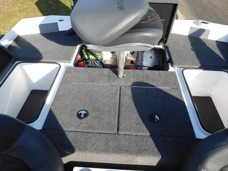 Slide: The Image of 2025 Vexus AVX 2080 boat interior with seating and storage compartments. - 10