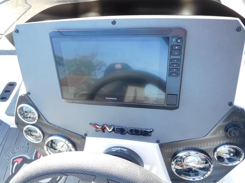 Slide: The Image of Dashboard of 2025 Vexus AVX 2080 boat with Garmin display and gauges. - 2