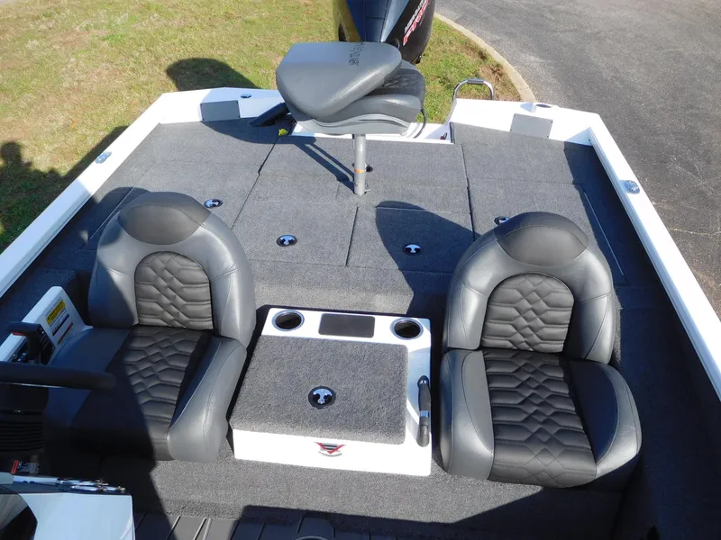 Slide: The Image of 2025 Vexus AVX 2080 boat interior with two seats and a center console. - 3