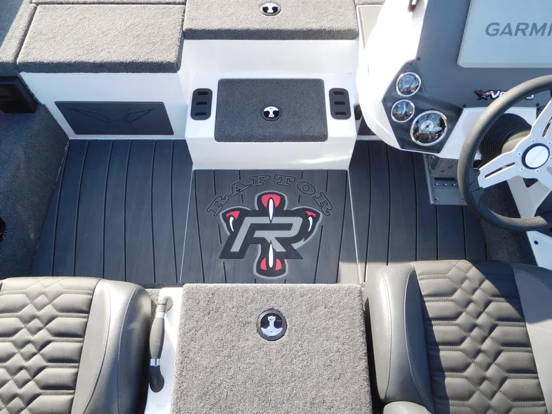 Slide: The Image of 2025 Vexus AVX 2080 boat interior with Garmin dashboard and Raptor flooring. - 4