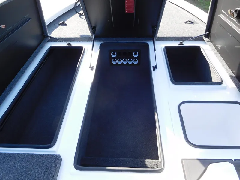 Slide: The Image of 2025 Vexus AVX 2080 boat storage compartments with open lids. - 6
