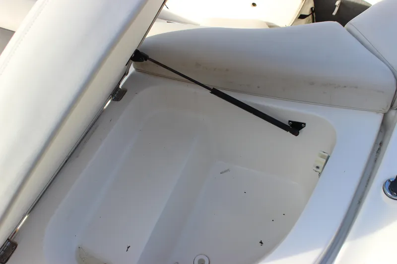 Slide: The Image of Open storage compartment in 2006 Chaparral 256 SSi boat. - 31